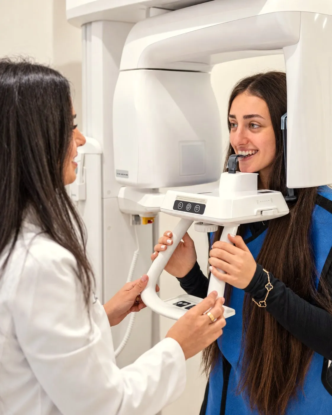 Dr. Haykani positioning a patient for a digital X-ray at SC Orthodontics