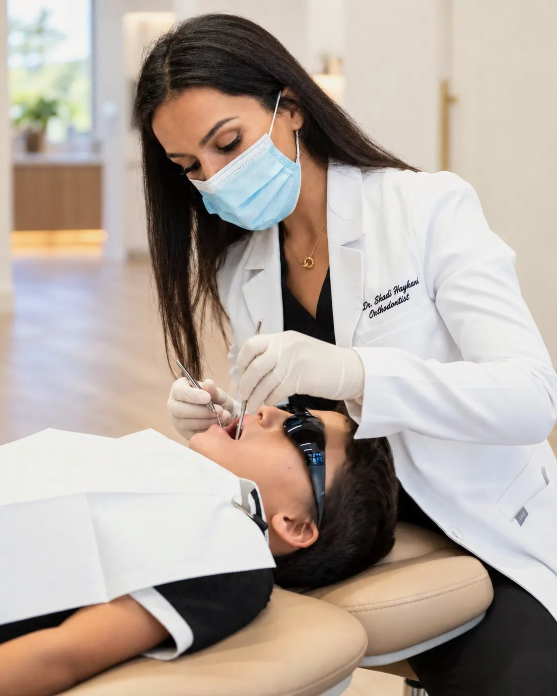 Dr. Haykani examining a young patient