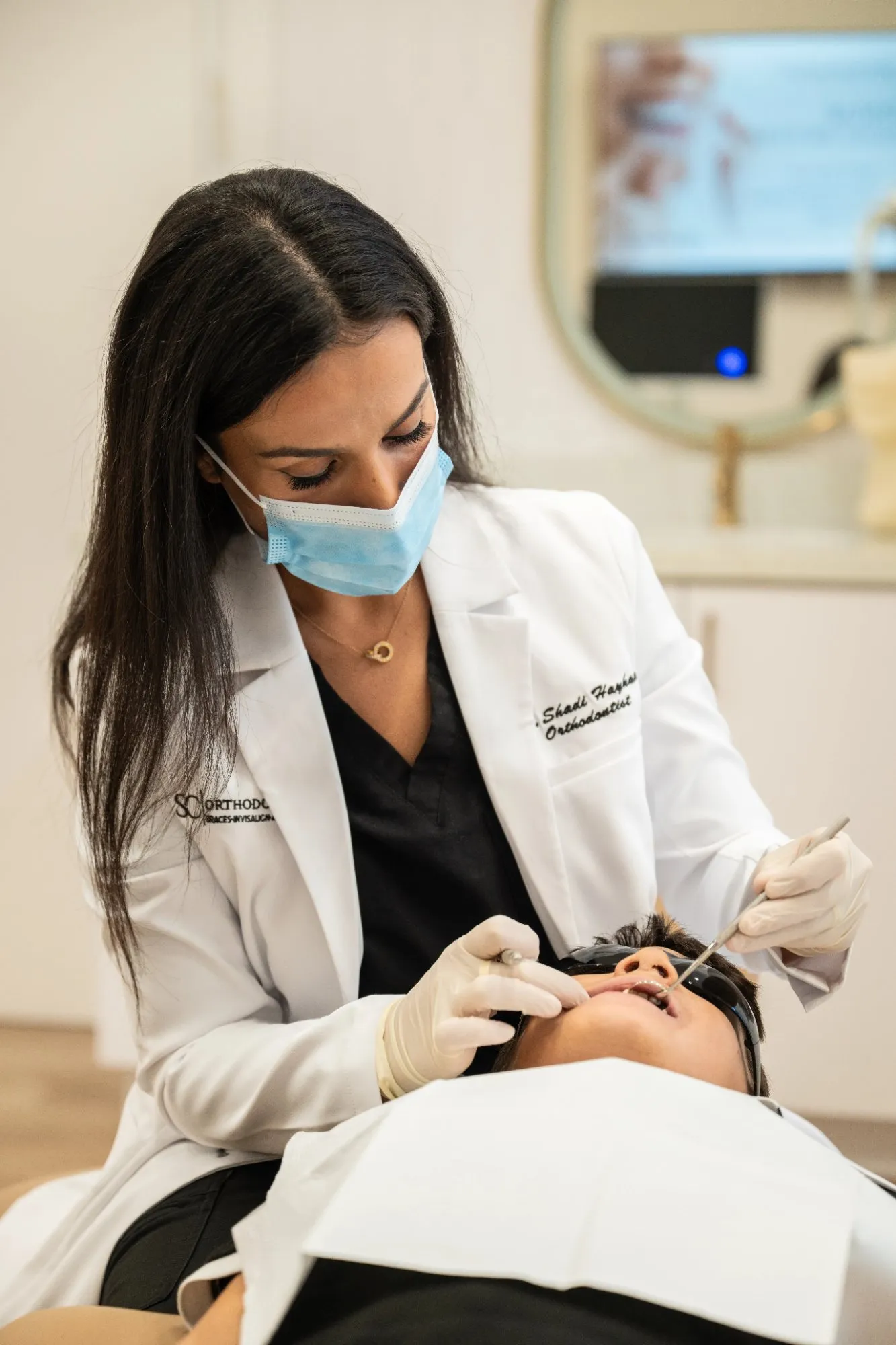 Dr. Haykani examining a young patient