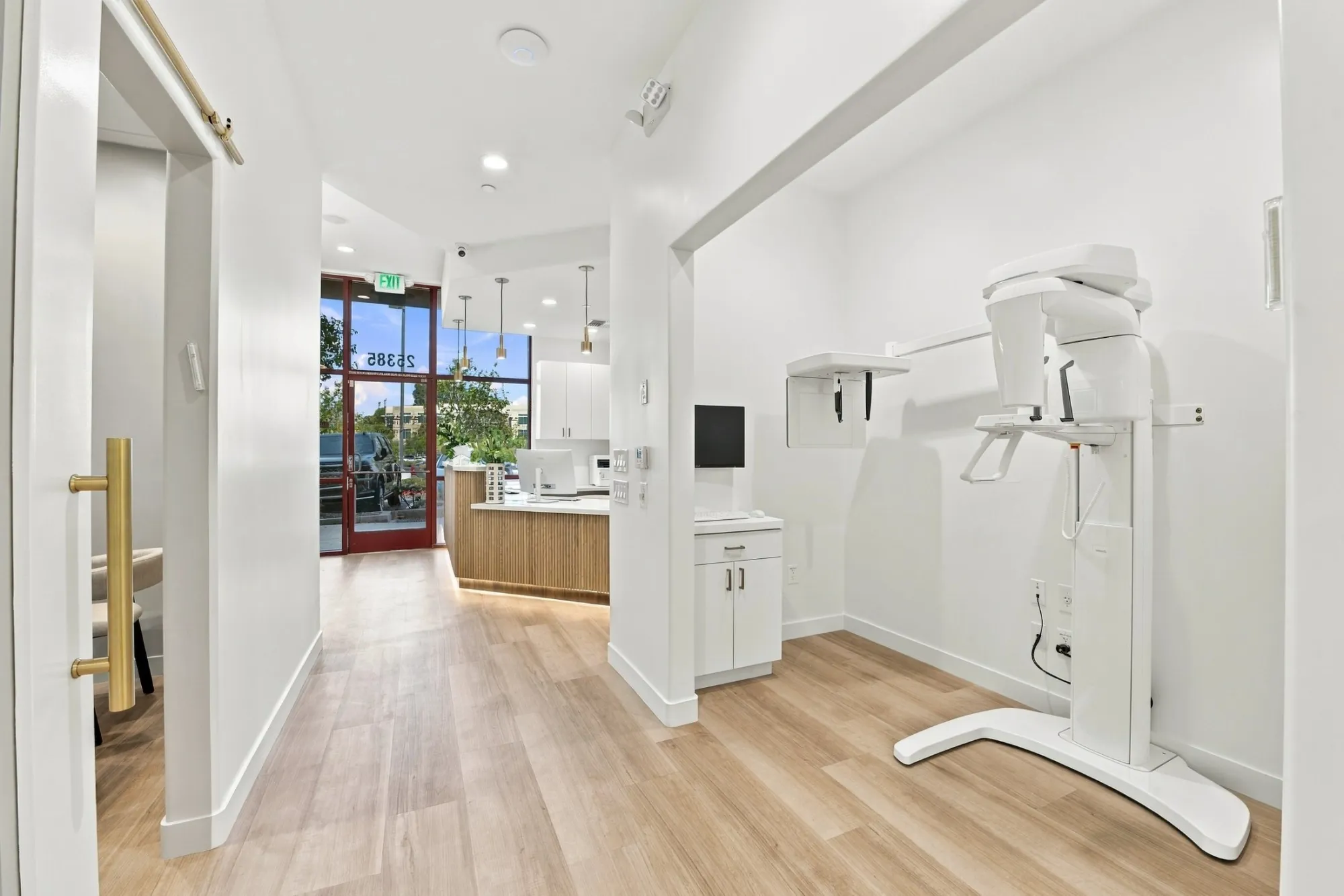 The imaging suite and hallway toward the front desk at SC Orthodontics in Valencia